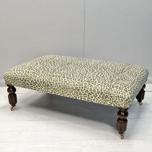 large leopard print footstool on castors - CATEGORY: ANTIQUE STOOLS - DATED 19TH CENTURY
