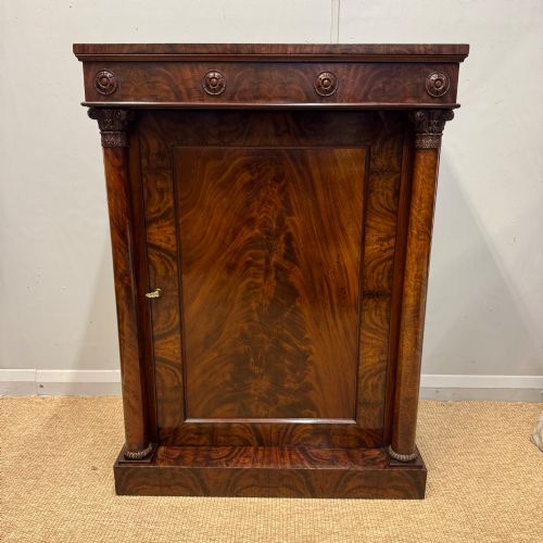 Late Regency mahogany pier cabinet with adjustable shelves