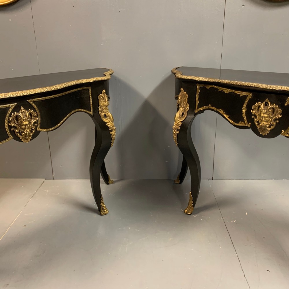 Pair of French ebonised console tables with brass mounts View IX