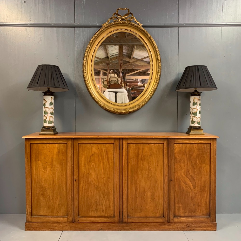 Slim four door mahogany low bookcase  View II