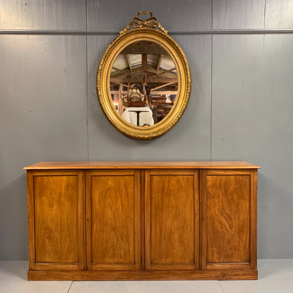 Slim four door mahogany low bookcase  View III