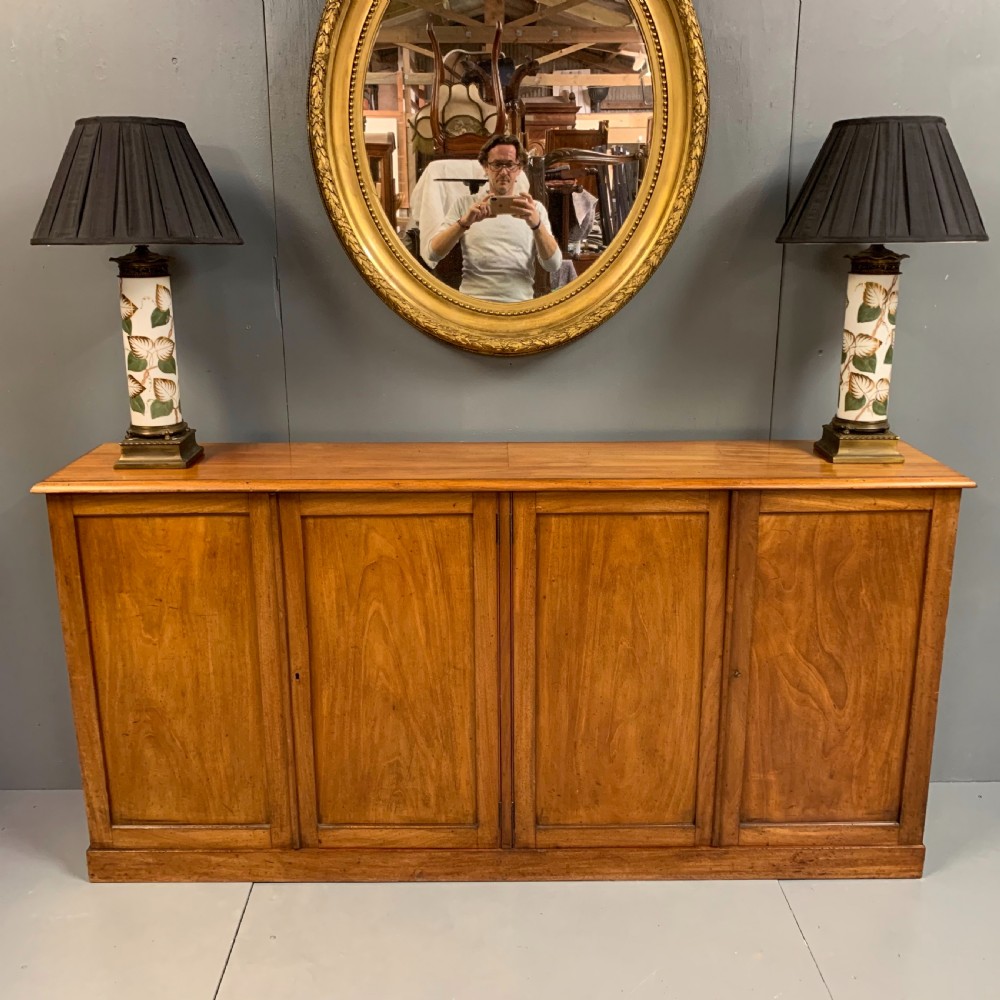 Slim four door mahogany low bookcase  View IV