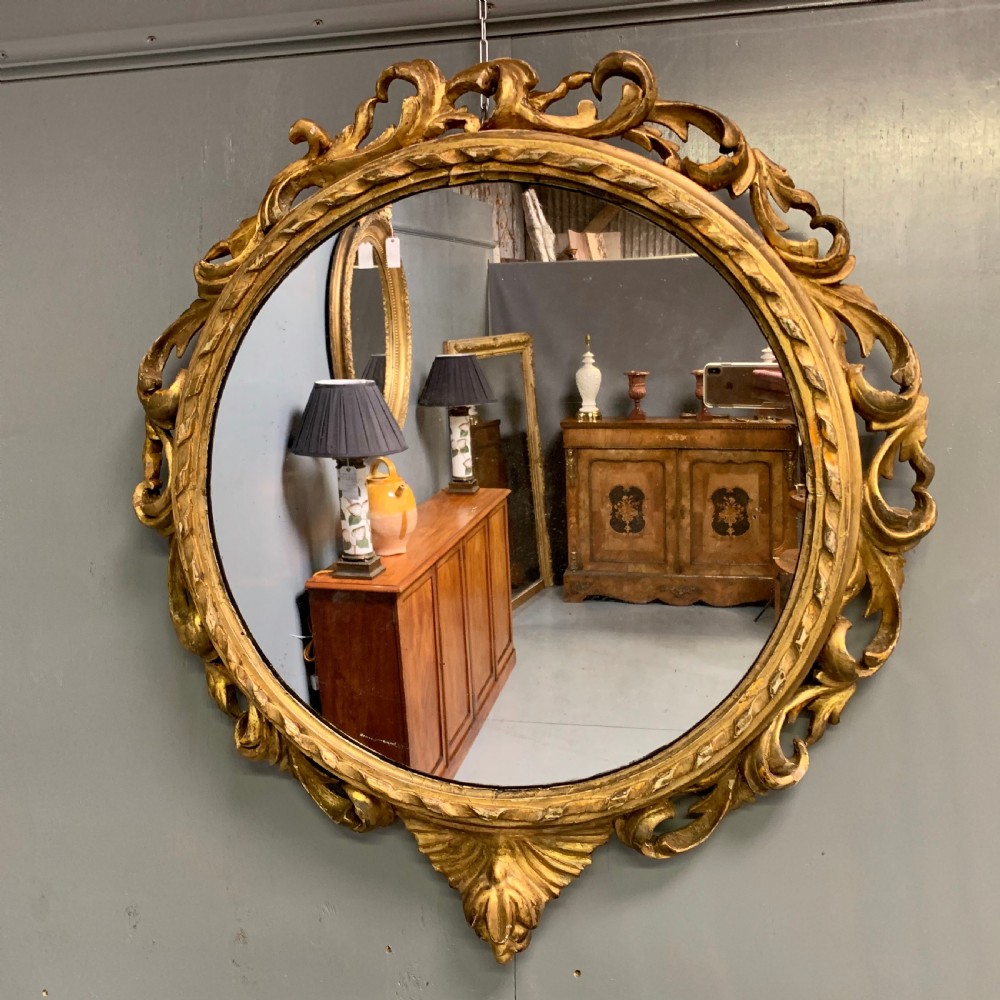 Large c18th Italian carved giltwood mirror 