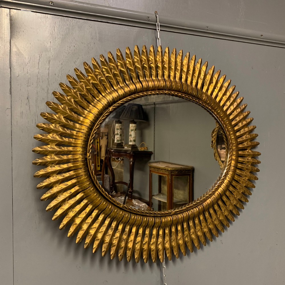 Spanish oval gilt toleware sunburst mirror 75.5cm  View V
