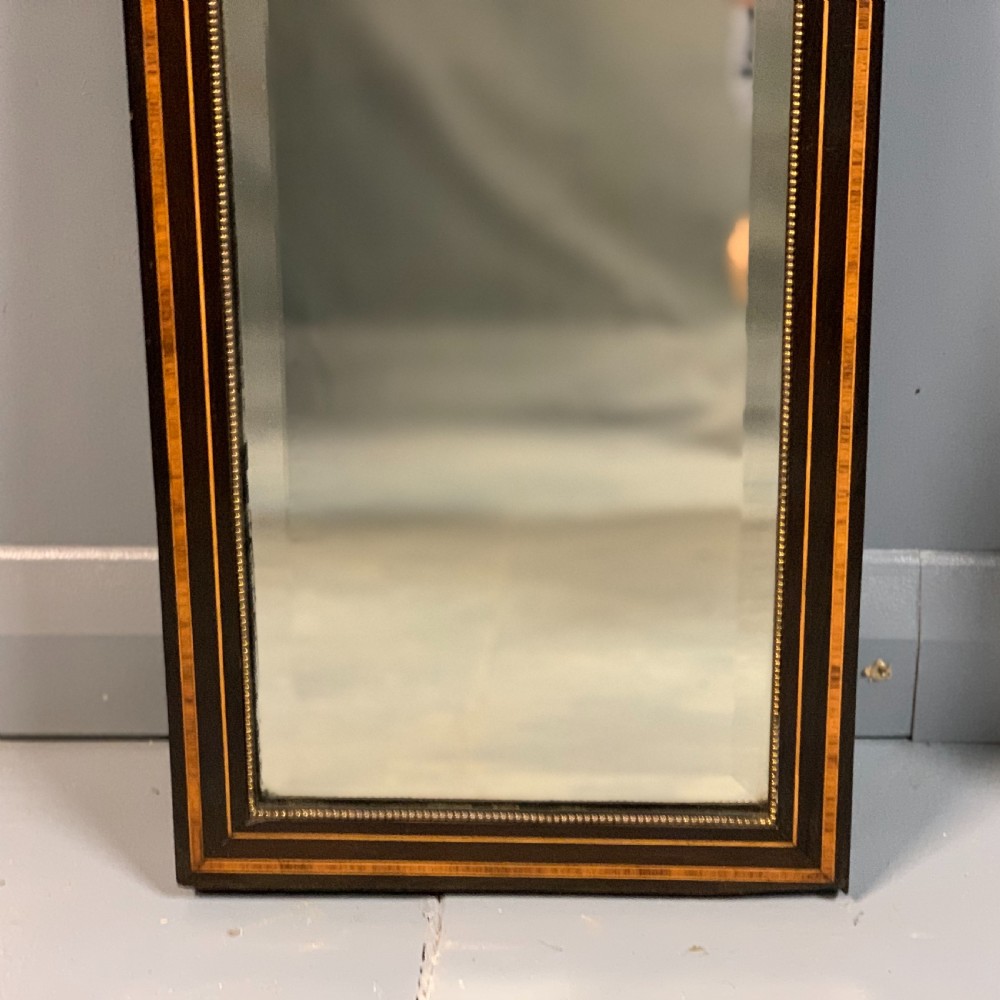 Pair of c19th amboyna and ebonised pier mirrors View IV
