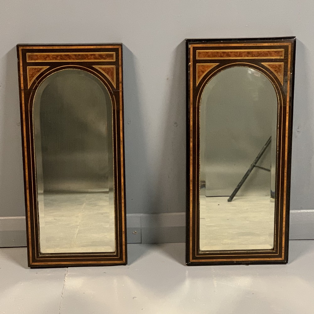 Pair of c19th amboyna and ebonised pier mirrors View IX