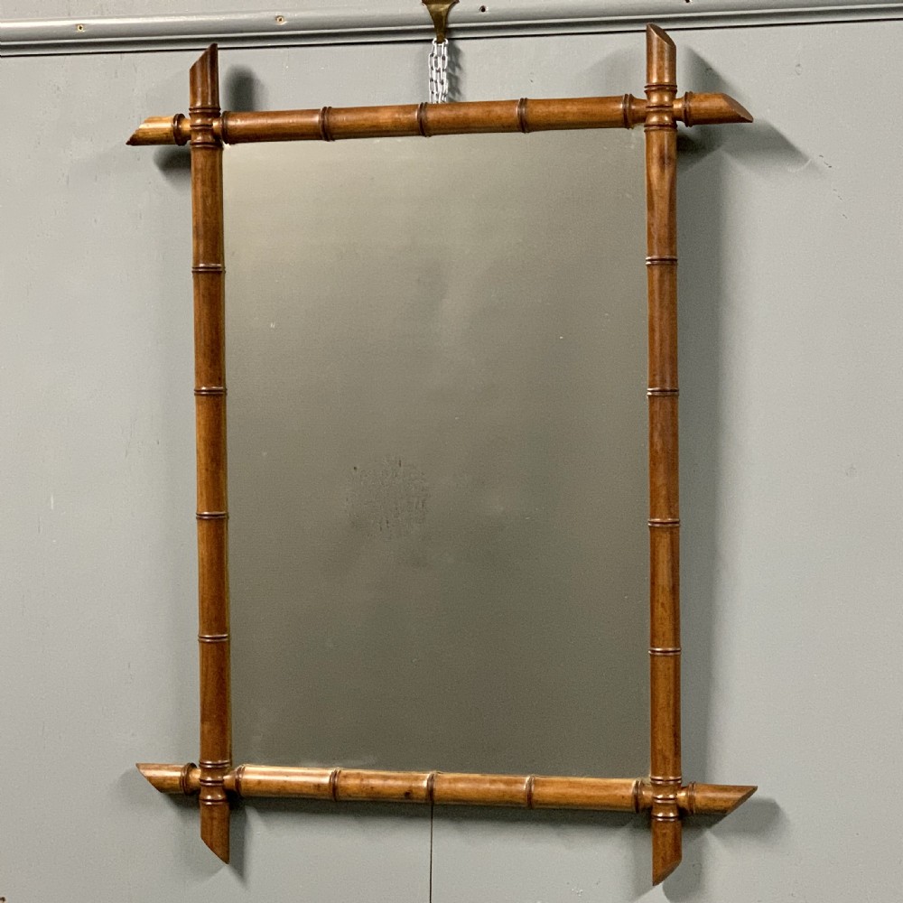 Single large French faux bamboo mirror