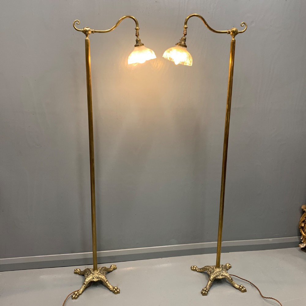 Pair of adjustable brass standard lamps 
