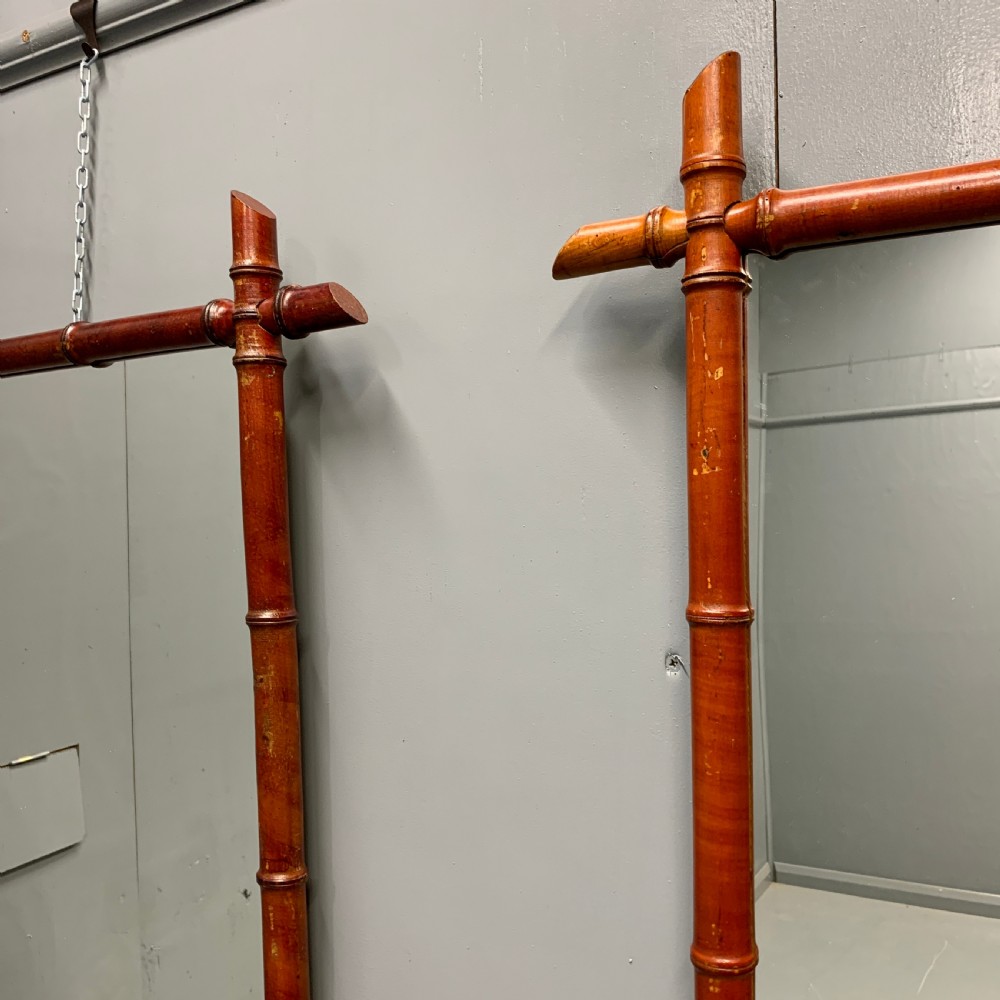Matched pair of red faux bamboo mirrors View II