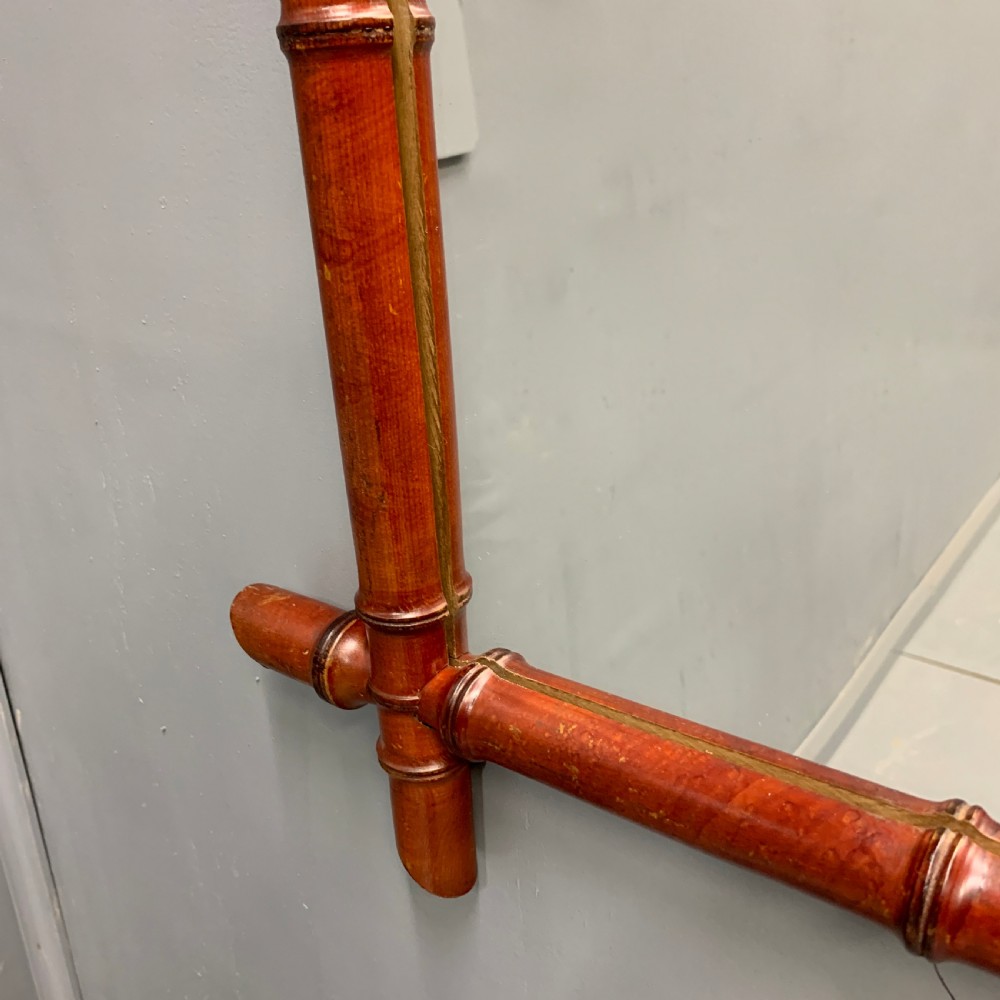 Matched pair of red faux bamboo mirrors View IV
