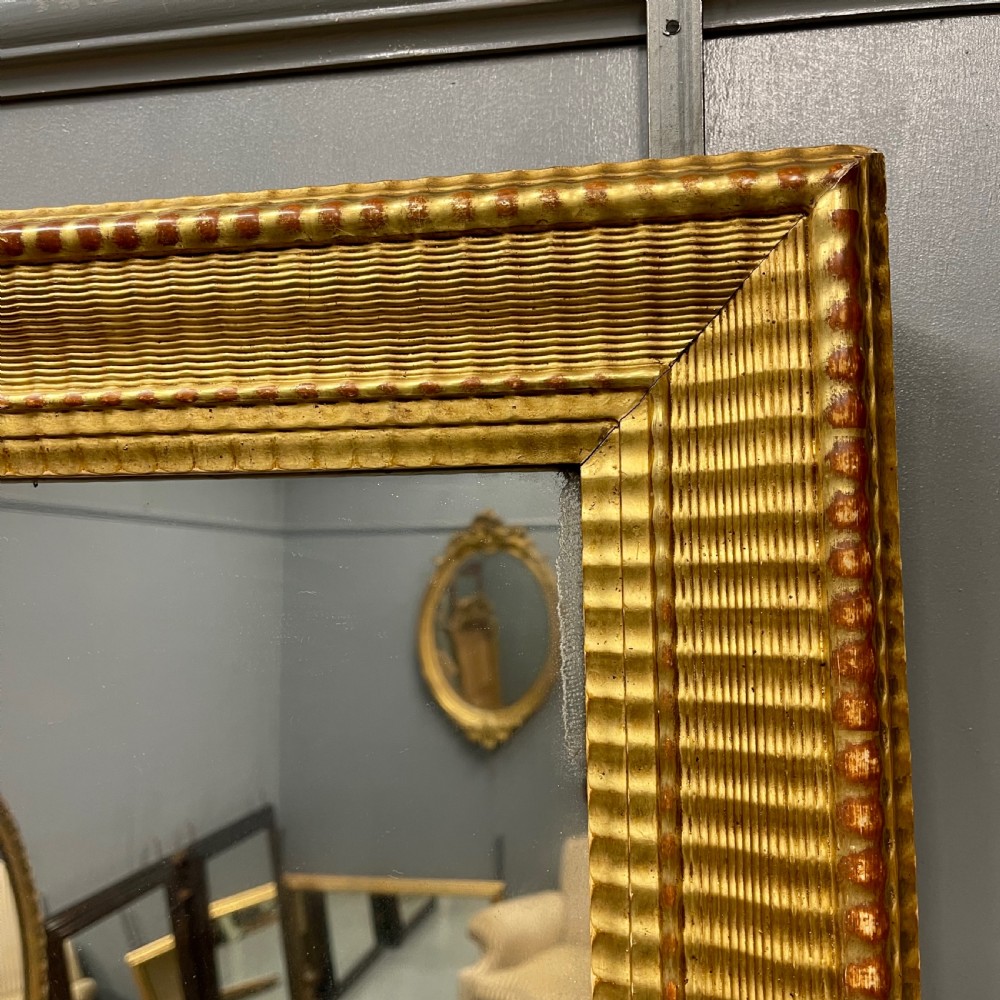 Large 19th century French rippled gilt mirror View VI