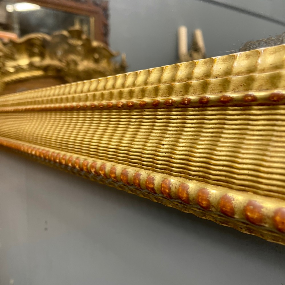Large 19th century French rippled gilt mirror View VII