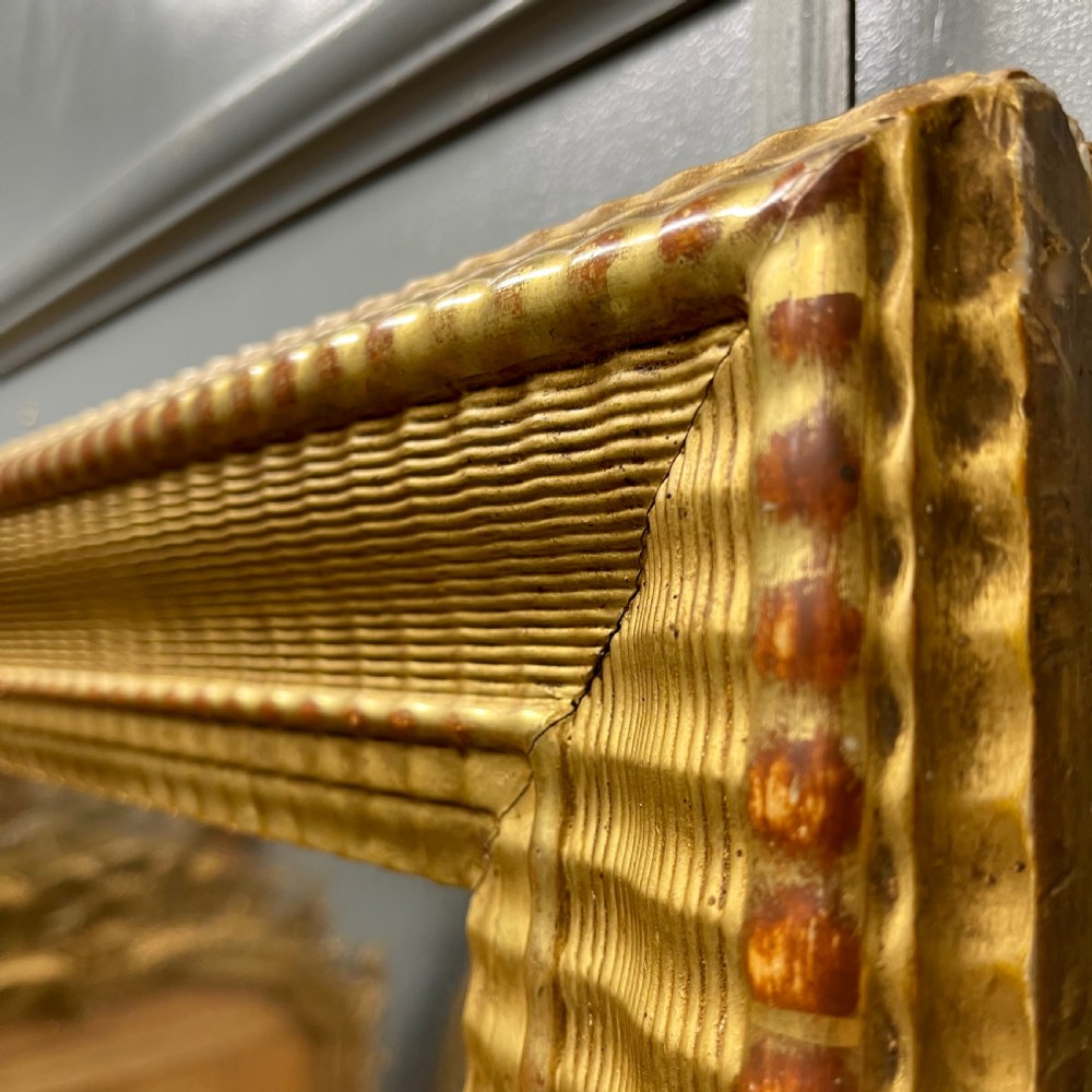 Large 19th century French rippled gilt mirror View VIII