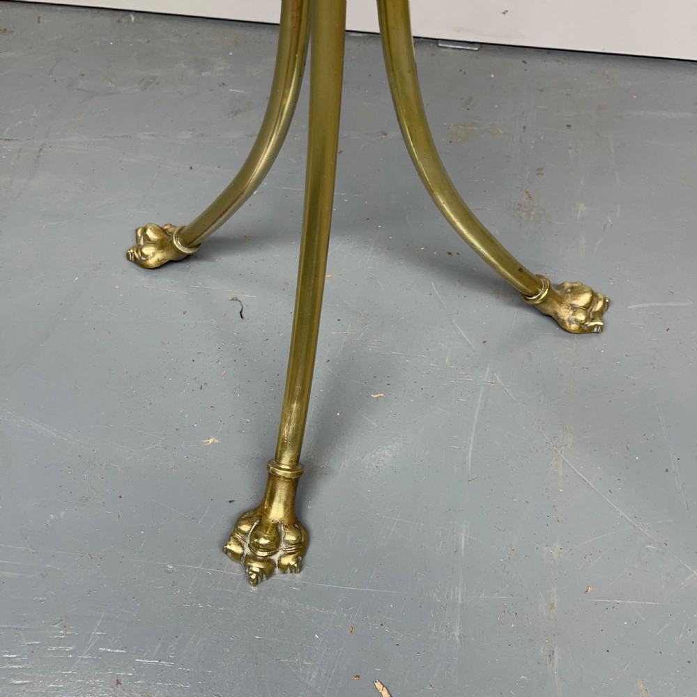 Brass and oak revolving magazine rack on claw feet View II