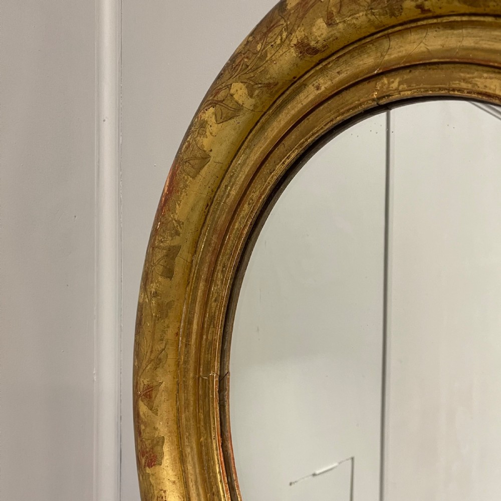 19th century French oval gilt mirror View II