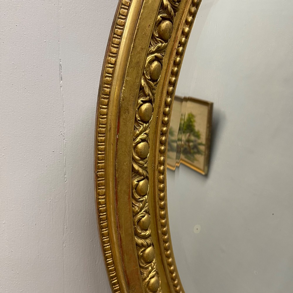 Large French oval gilt mirror with original glass View VII