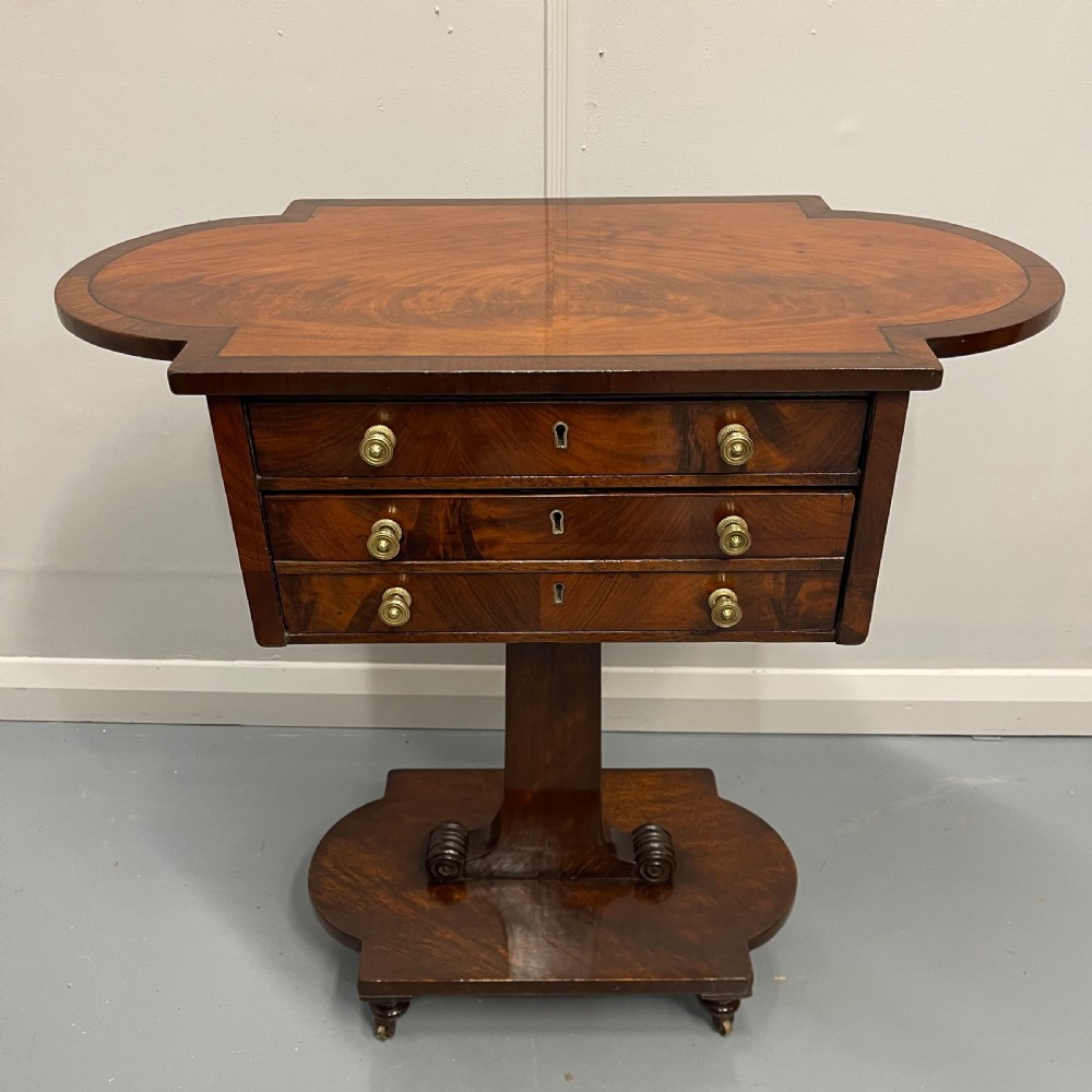 Double sided Regency mahogany inlaid work table 
