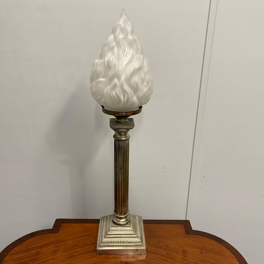 Nickel plated Corinthian column lamp with glass torch shade