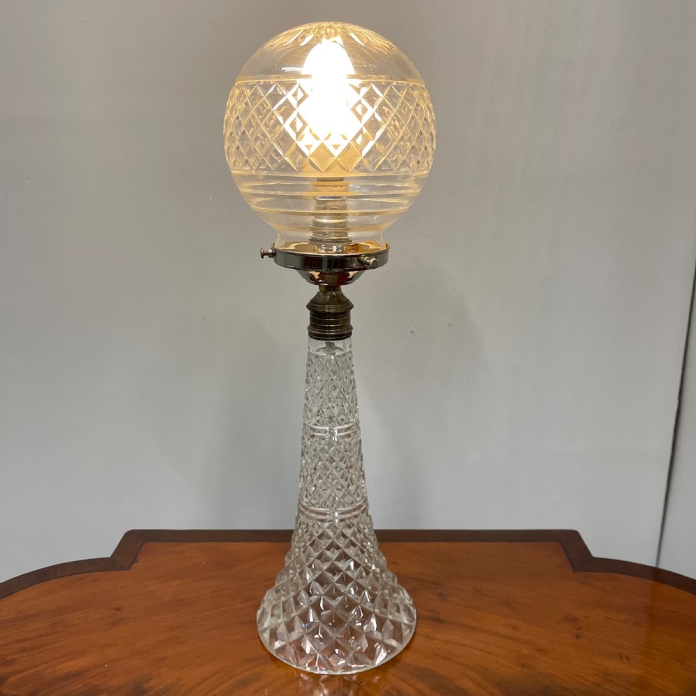 Cut and pressed glass globe table lamp