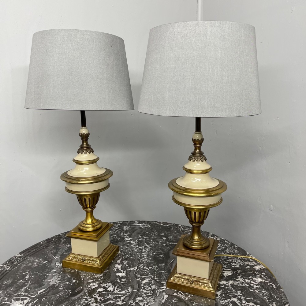 Pair of brass and enamelled lamps