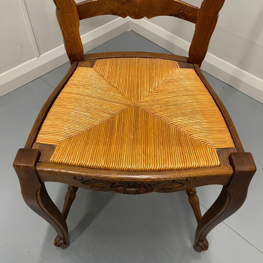Set of 4 French oak rush seat chairs View VI