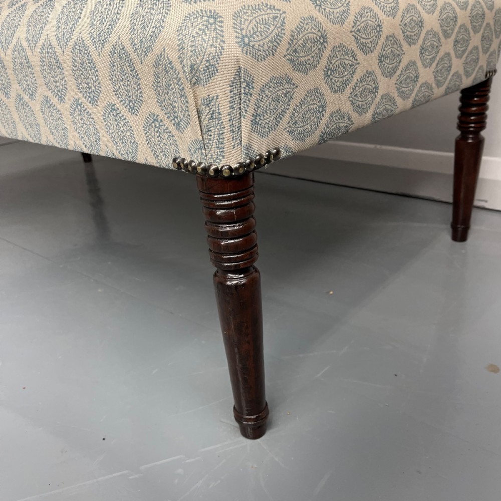 Regency footstool with turned legs and leaf motif View III
