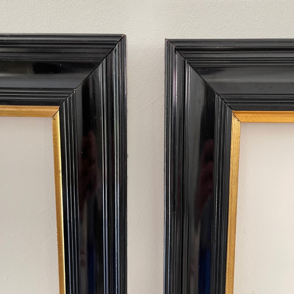 Pair of black lacquered pier mirrors  View II