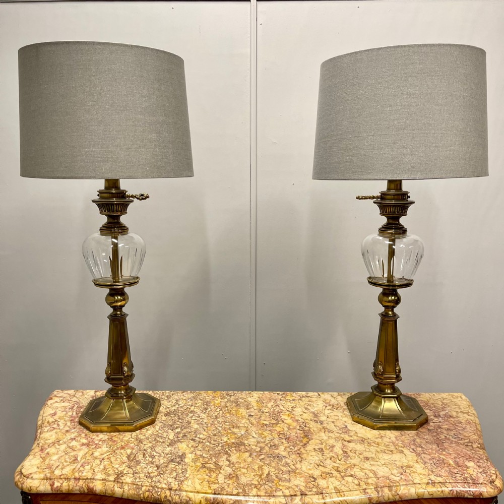 Pair of brass and cut glass table lamps