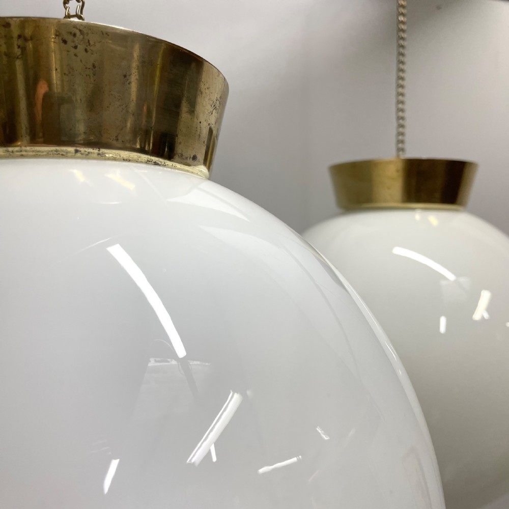 Pair of opaline milk glass globe pendant lights View II