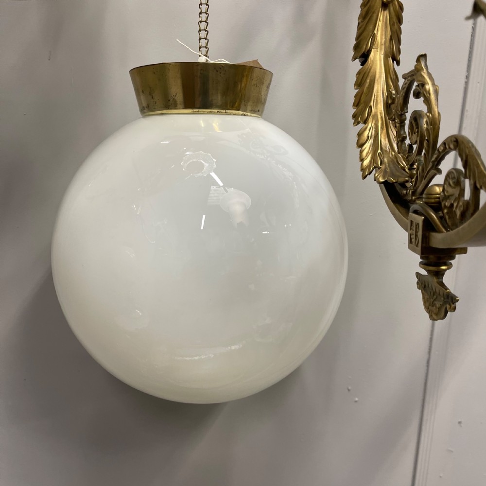 Pair of opaline milk glass globe pendant lights View VI