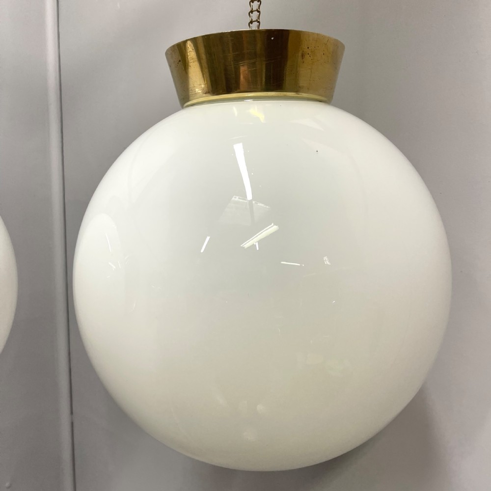 Pair of opaline milk glass globe pendant lights View VII