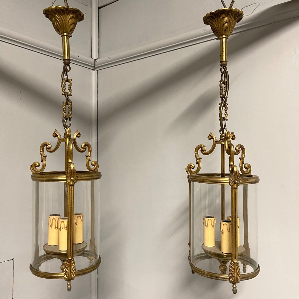 Pair of French brass cylinder hanging lanterns