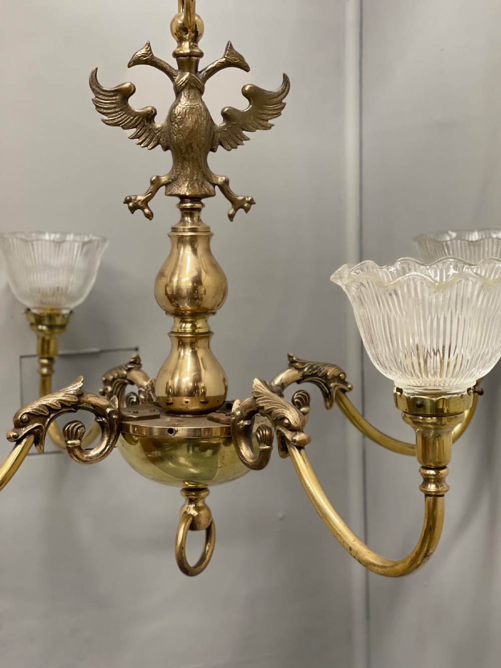 Large brass chandelier with holophane shades  View V