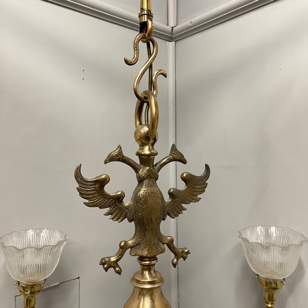 Large brass chandelier with holophane shades  View VI