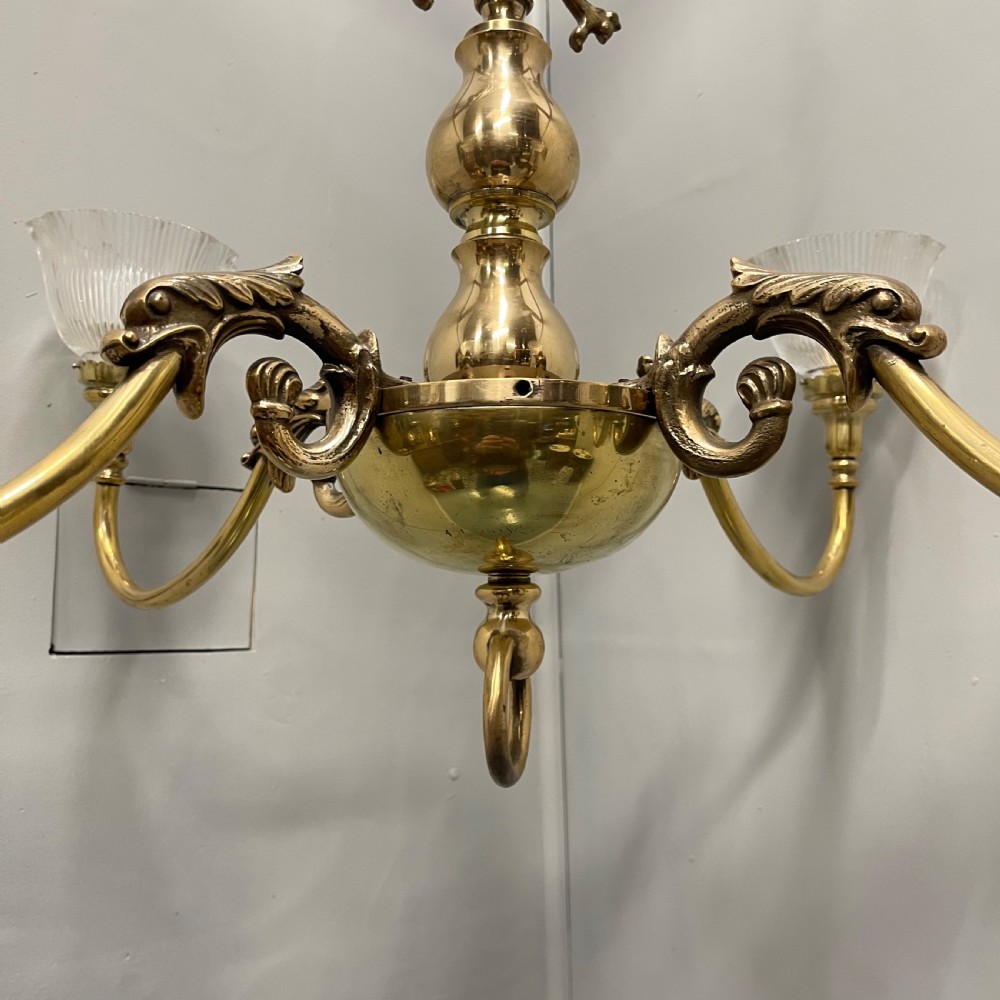 Large brass chandelier with holophane shades  View VIII