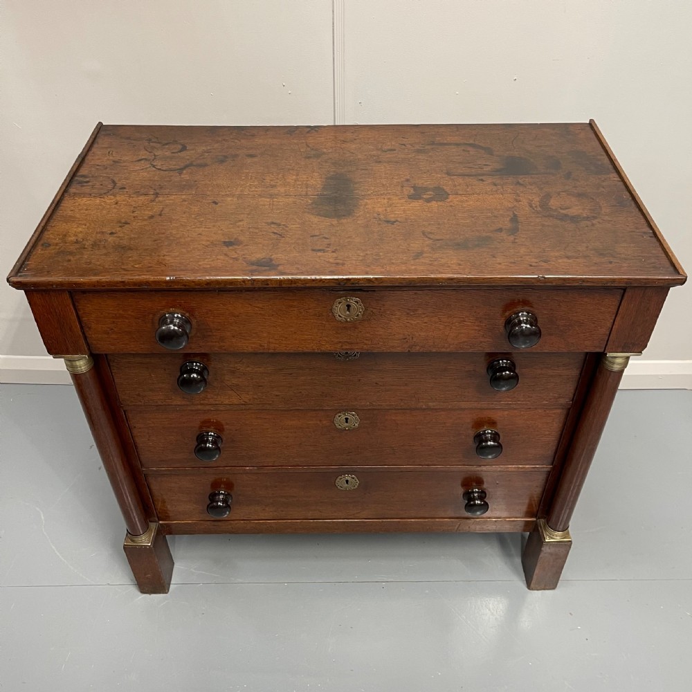 French Empire oak commode with black handles View VII