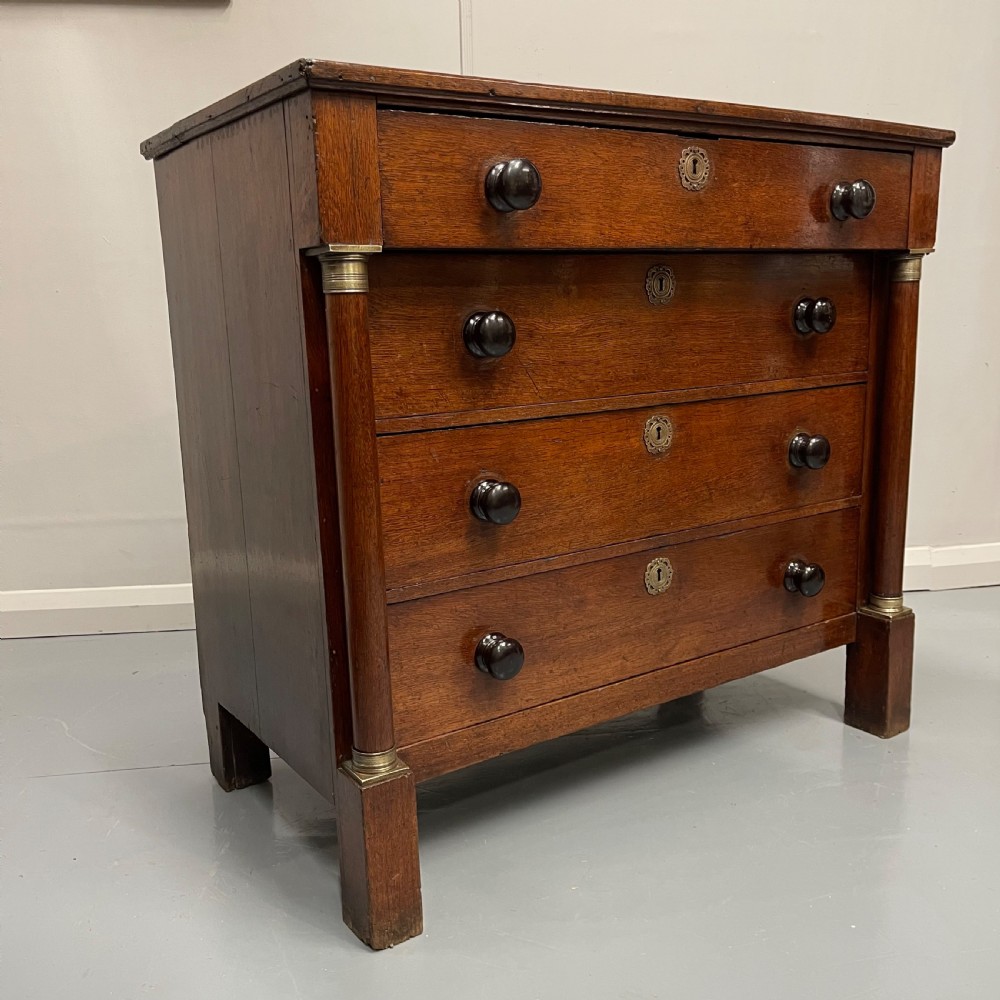 French Empire oak commode with black handles View X