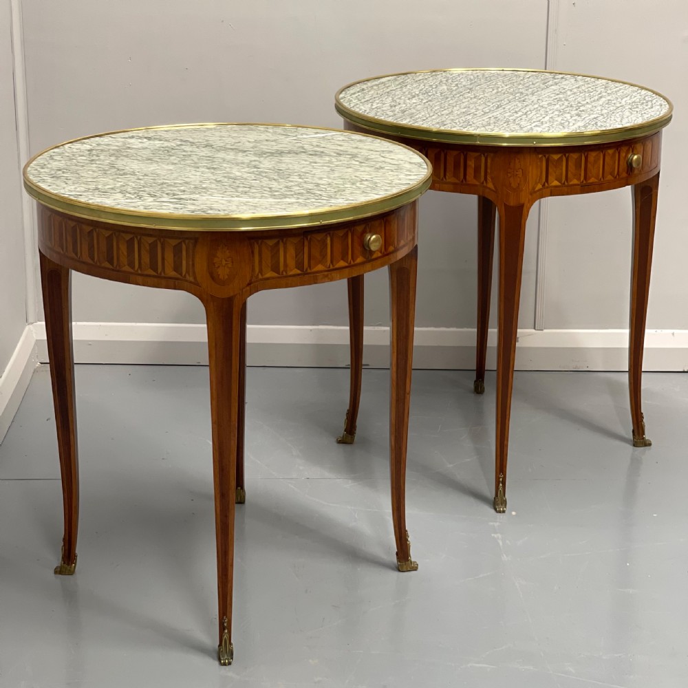Pair of round kingwood parquetry lamp tables