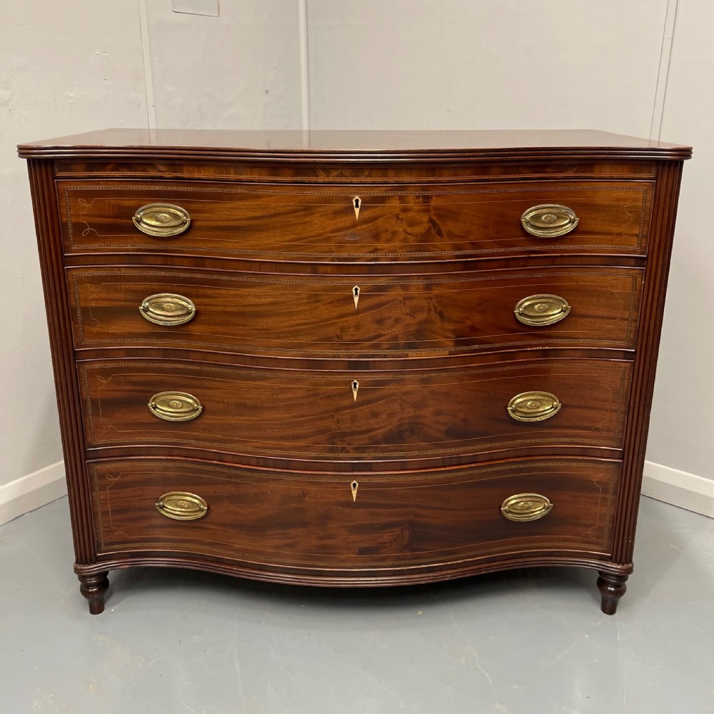 Georgian inlaid serpentine chest of drawers View II