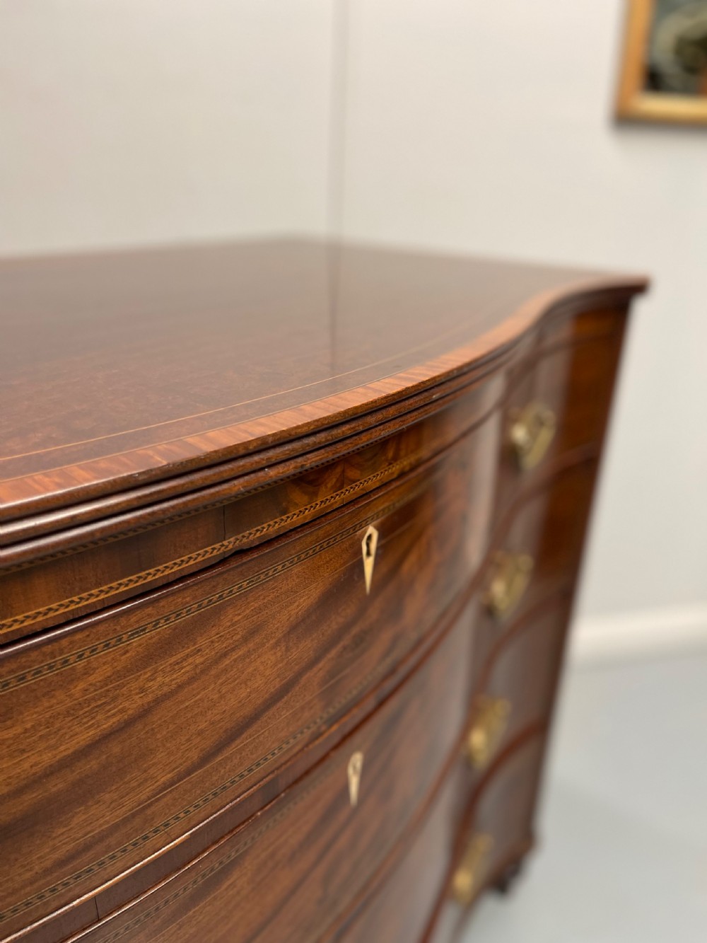 Georgian inlaid serpentine chest of drawers View IV
