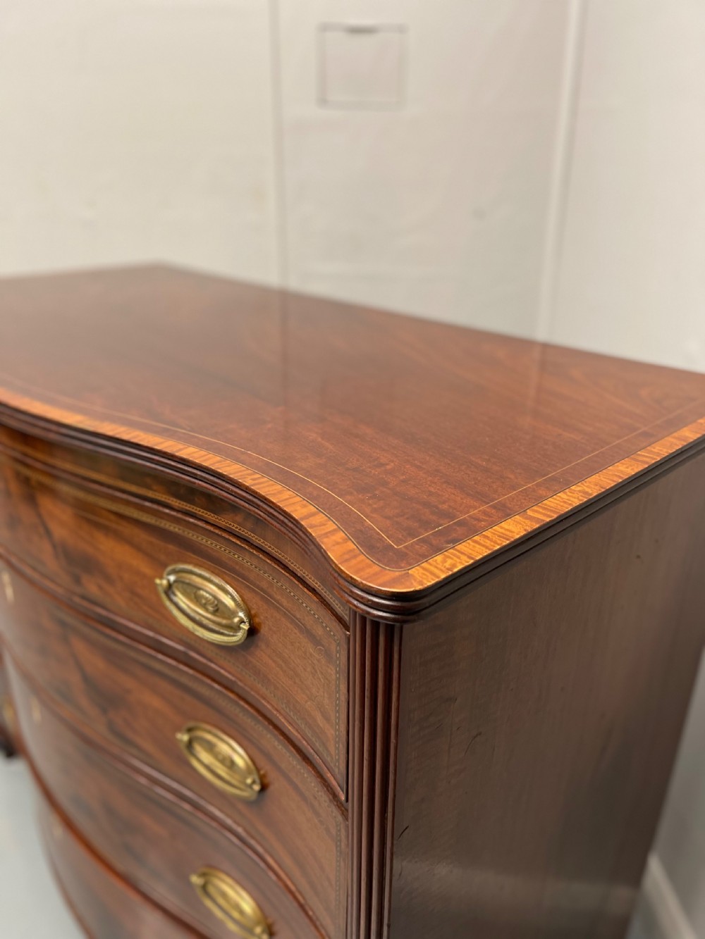Georgian inlaid serpentine chest of drawers View V