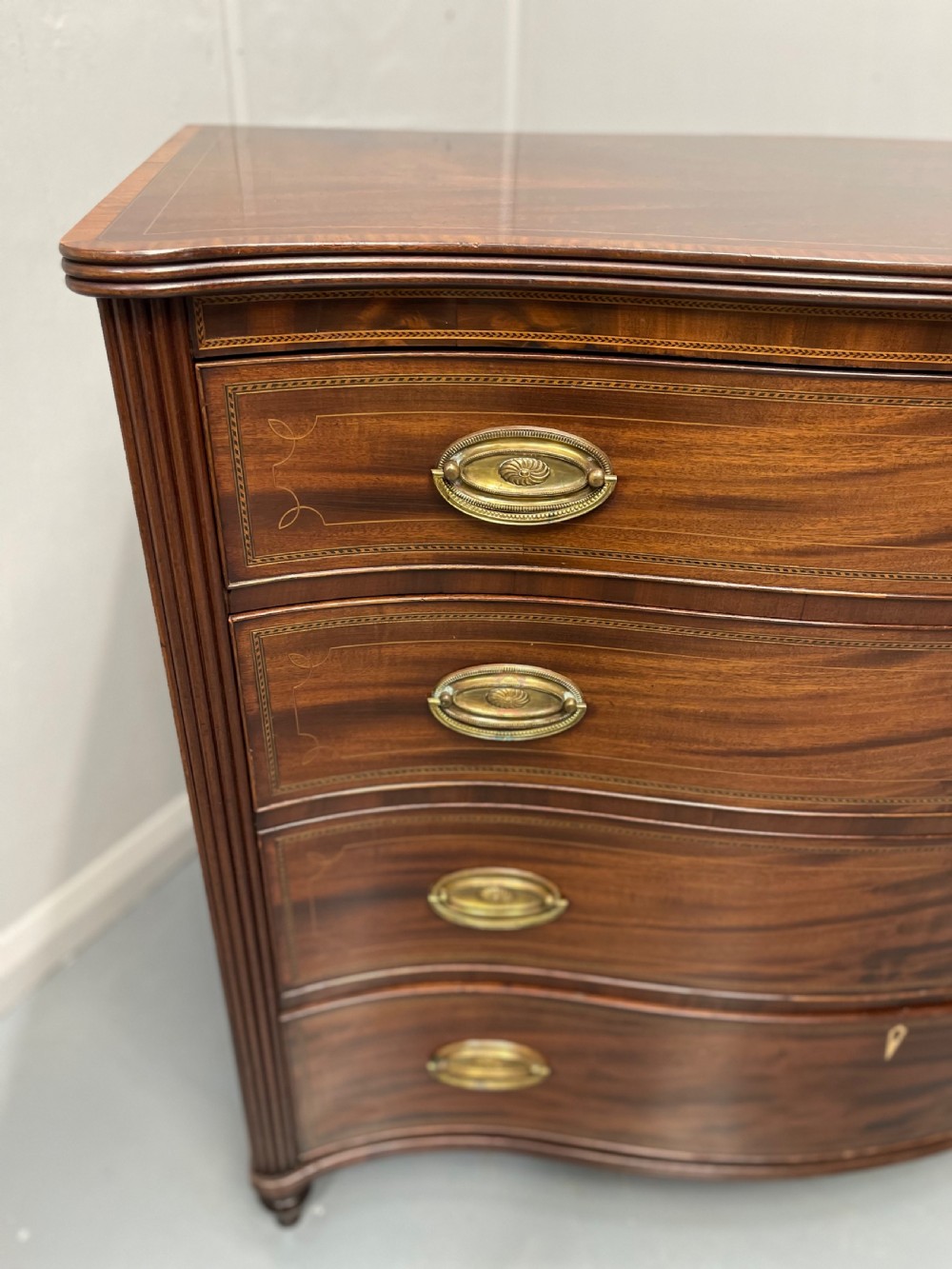 Georgian inlaid serpentine chest of drawers View VI