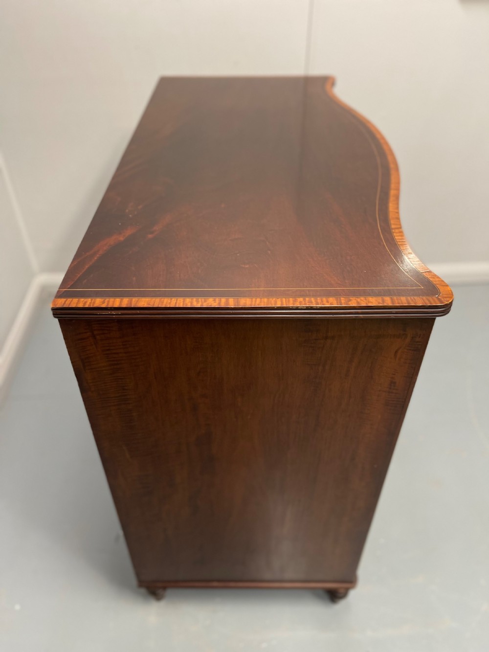 Georgian inlaid serpentine chest of drawers View VII