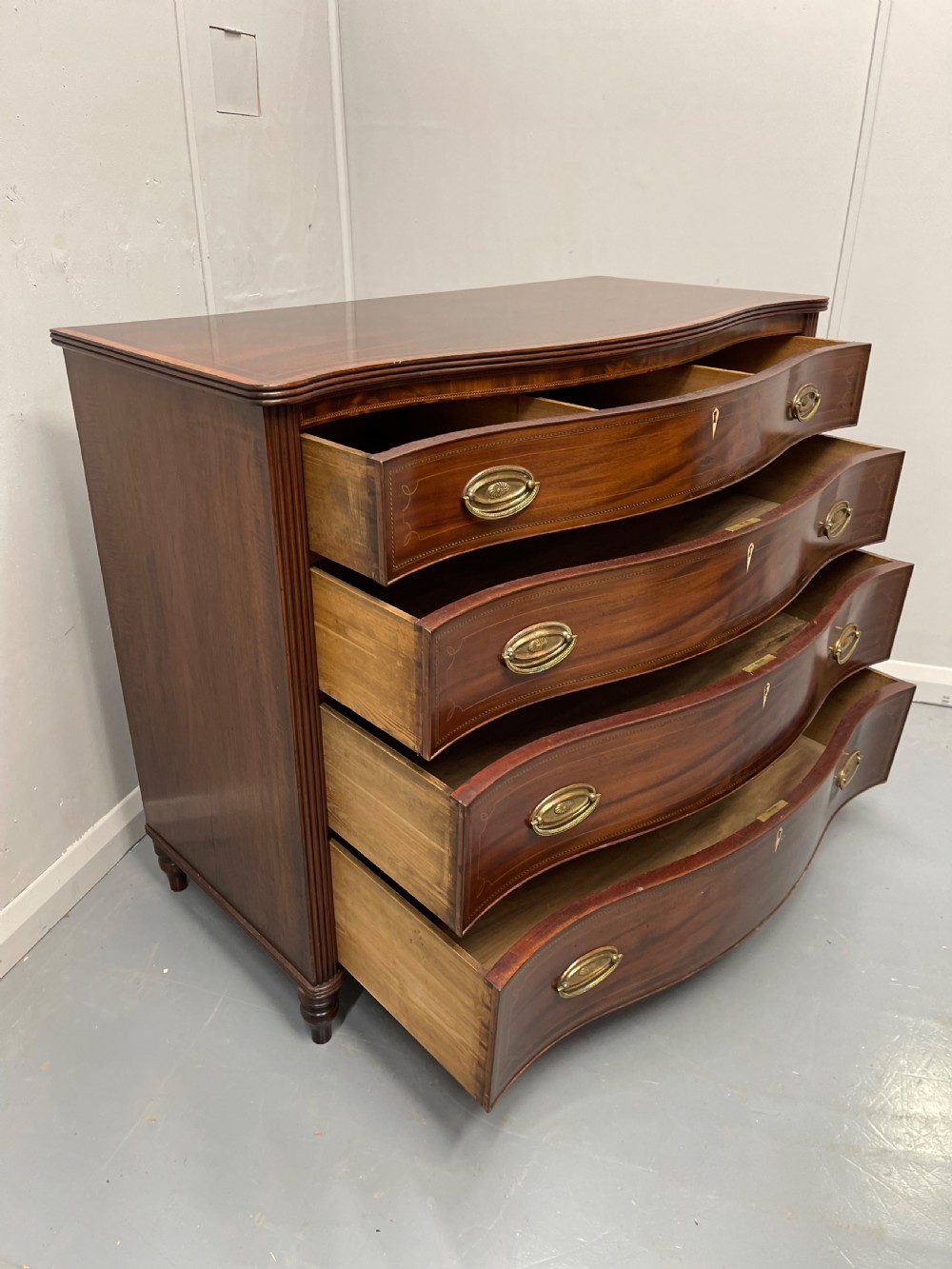 Georgian inlaid serpentine chest of drawers View VIII