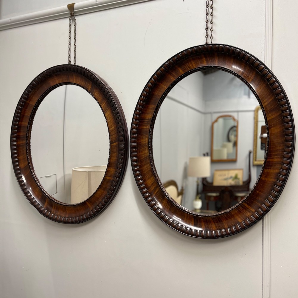 Pair of rosewood oval mirrors  View III