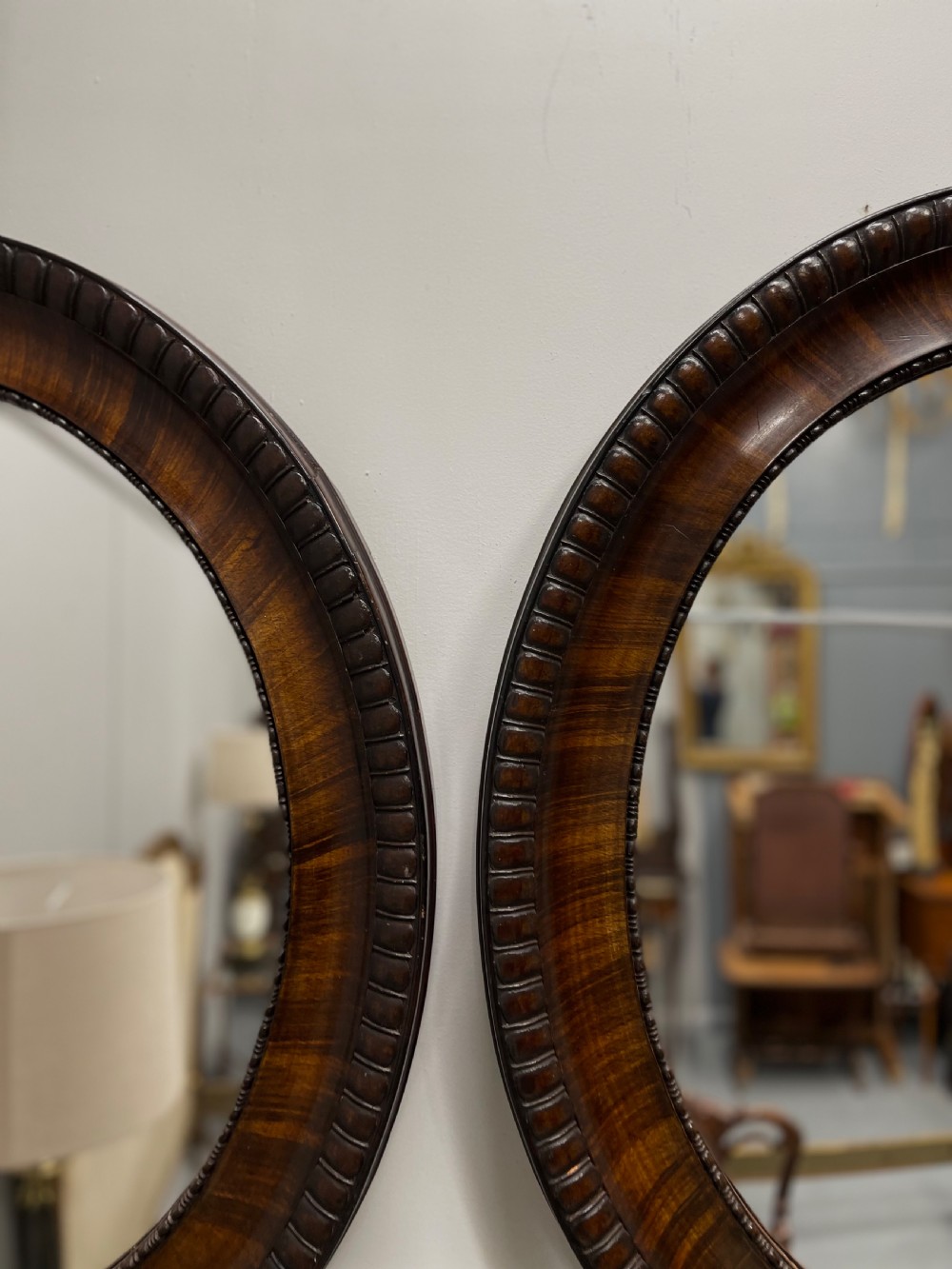 Pair of rosewood oval mirrors  View VI