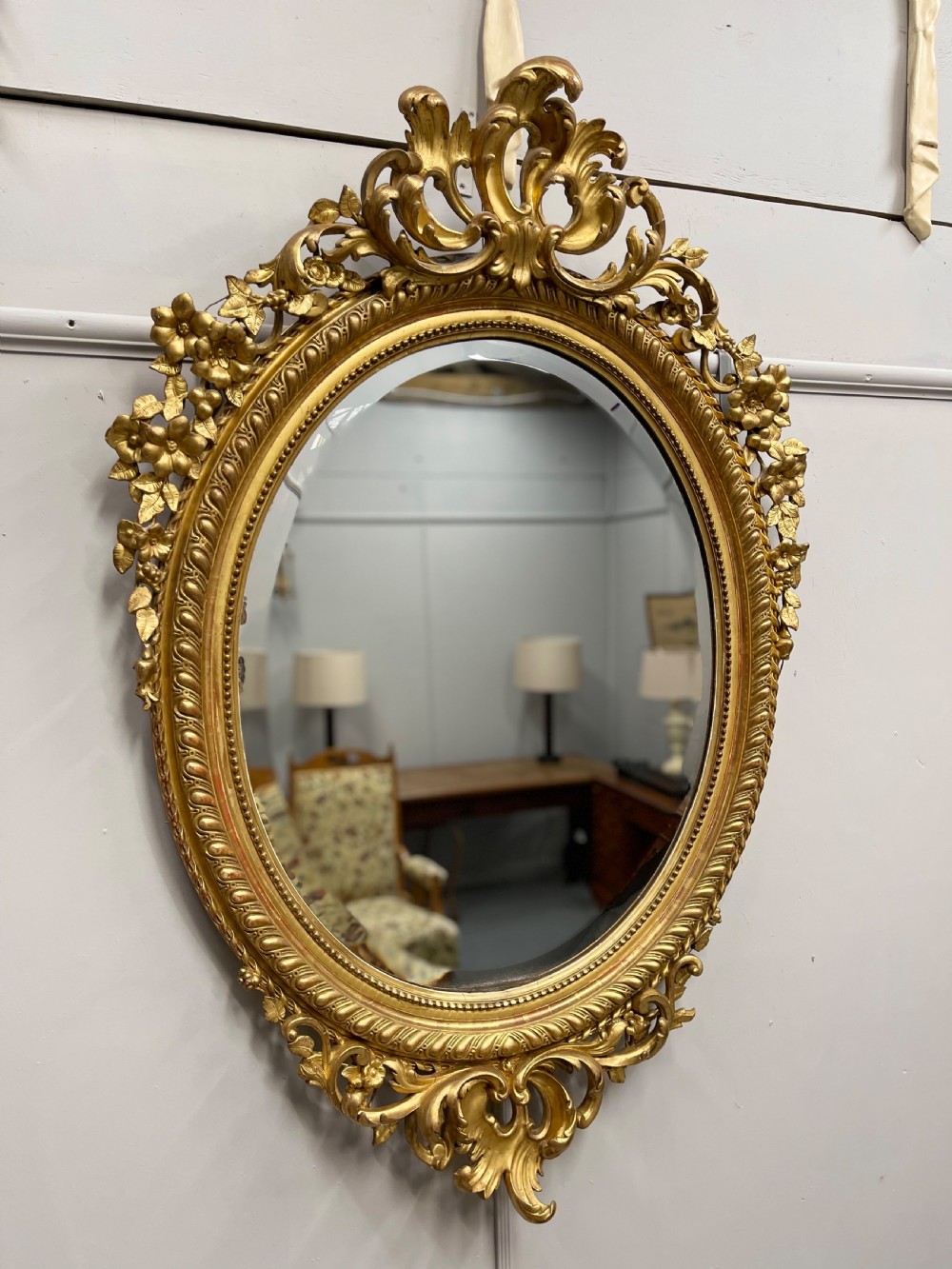 Large French 19th century oval gilt mirror
