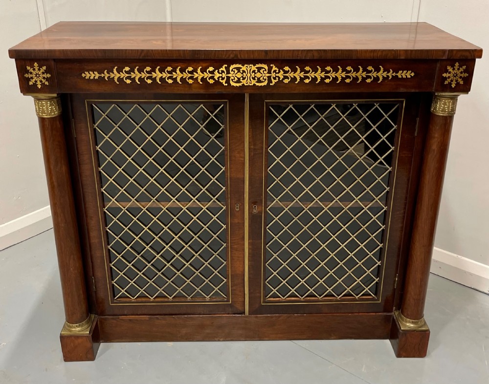 Regency rosewood and brass marquetry two door cabinet