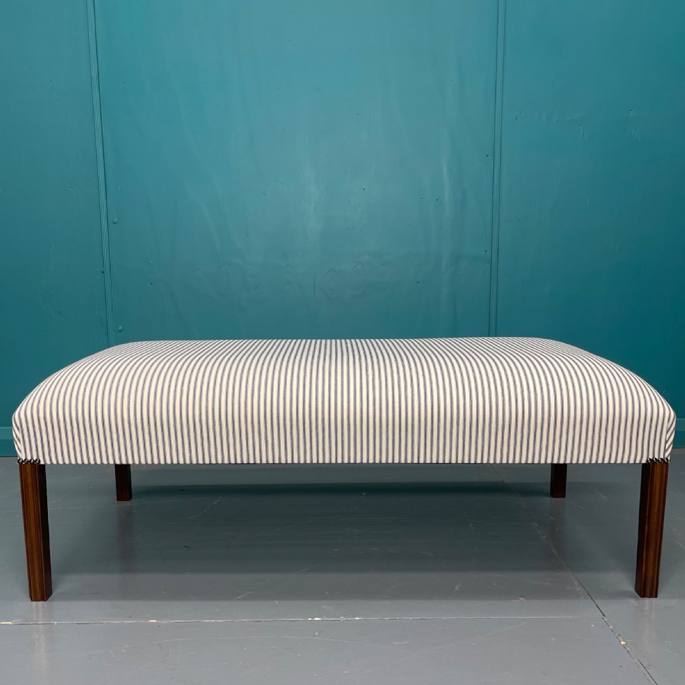 Ottoman centre footstool in ticking stripes 