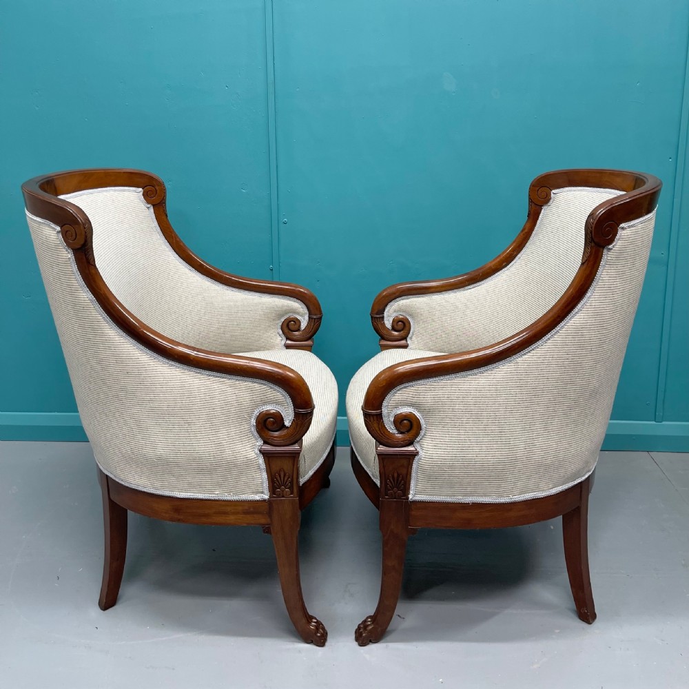 Newly upholstered pair of French Empire tub chairs View V